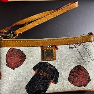 Dooney & Bourke Sports-Themed Wristlet with Black and Brown Accents